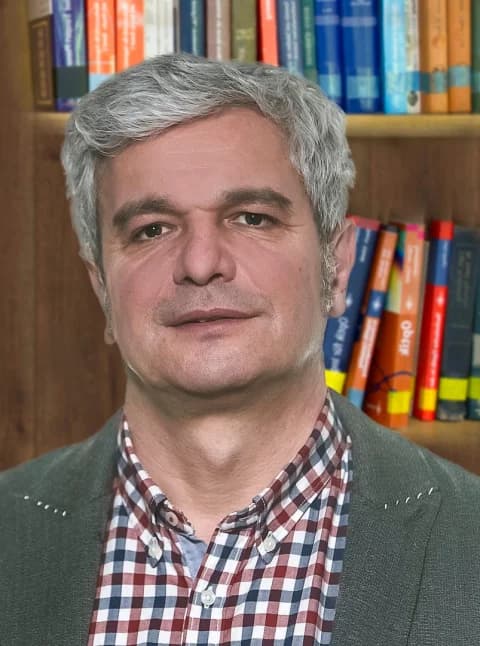 Prof. Julian M.
